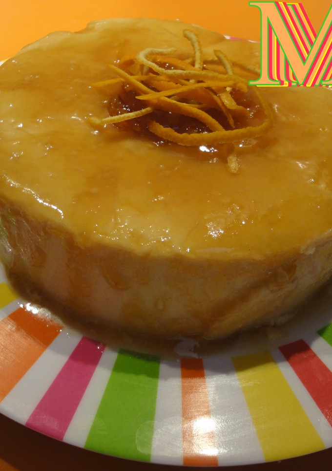 Una foto de Flan de queso y naranja