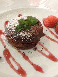 Una foto de Brownie de chocolate y pistacho