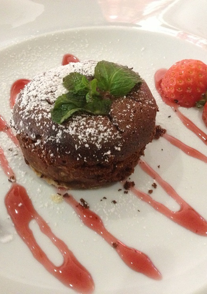 Una foto de Brownie de chocolate y pistacho