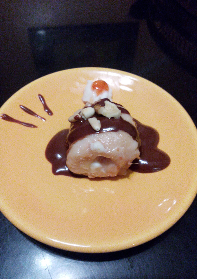 Una foto de Rollitos de pollo con salsa de chocolate