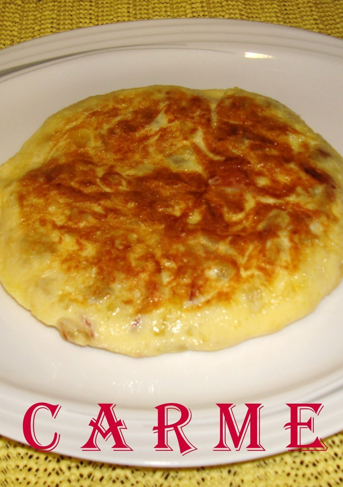 Una foto de Tortilla de patatas y embutidos
