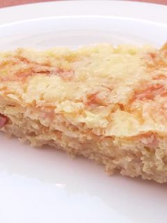 Una foto de Quiche de beicon y cebolla