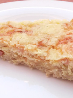 Una foto de Quiche de beicon y cebolla