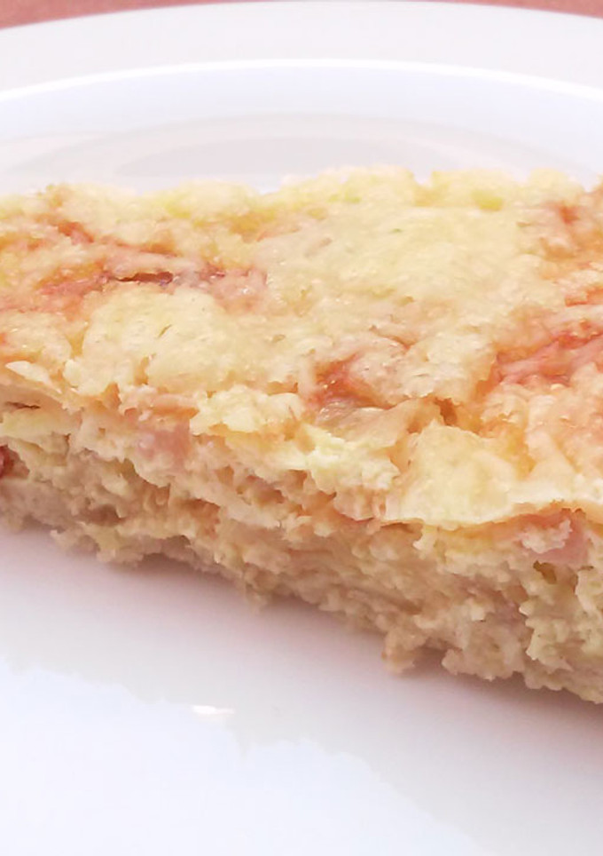 Una foto de Quiche de beicon y cebolla