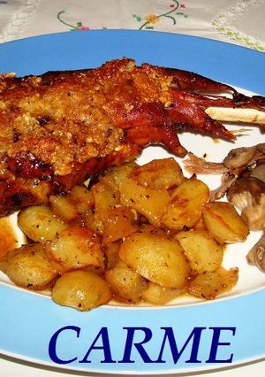 Una foto de Cabrito asado con frutos secos
