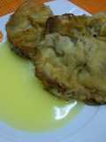Ternera empanada con salsa de naranja