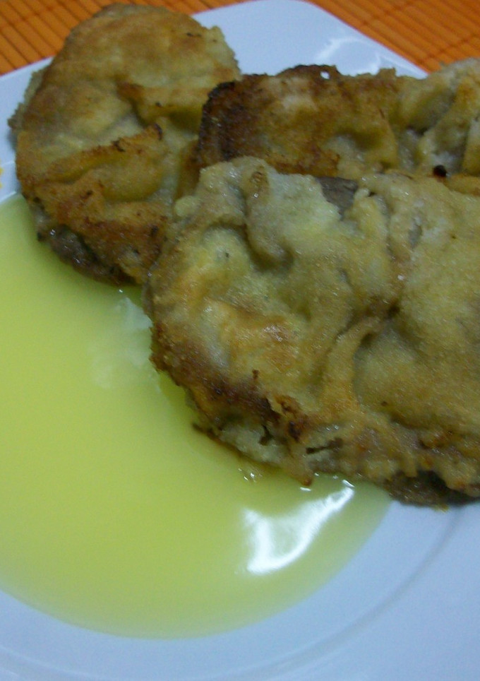 Una foto de Ternera empanada con salsa de naranja