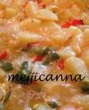 Tortilla de patata, pimientos y cebolla