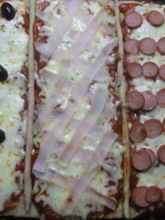 Una foto de Pizza integral de tres sabores