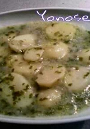Una foto de Papas en salsa verde 