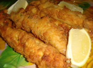 Una foto de Palitos de pescado frito crocante
