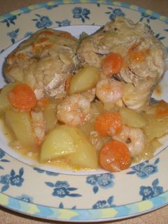 Una foto de Merluza guisada con patatas y zanahorias