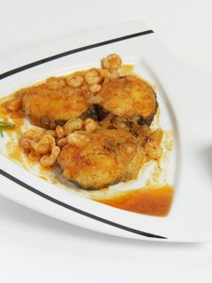 Una foto de Merluza a la marinera