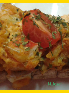 Una foto de Tosta de bacalao y gambas