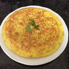 Una foto de Tortilla de patatas con cebolla AMC