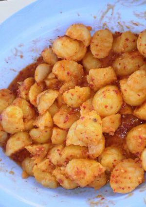Una foto de Papas enchiladas