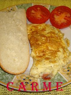 Una foto de Tortilla de jamón serrano y queso edam