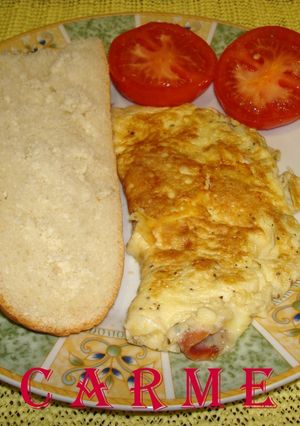 Una foto de Tortilla de jamón serrano y queso edam