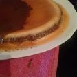 Flan de coco, chocolate y naranja