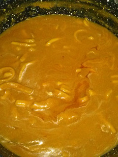 Una foto de Calamares al curry con cuscus