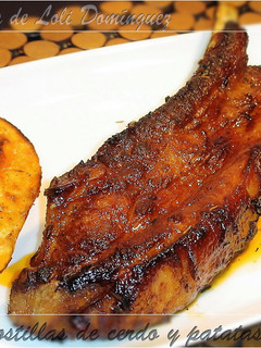 Una foto de Costillas de cerdo y patatas al horno