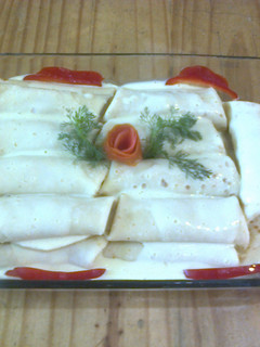 Una foto de Crepes rellenos de frutos del mar