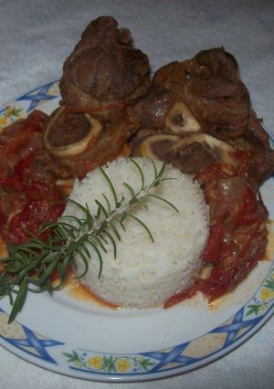 Una foto de Ossobuco con arroz