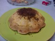 Una foto de migas de pan postre