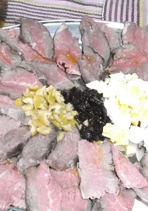 Una foto de Carpaccio de colita de cuadril o pollo de res