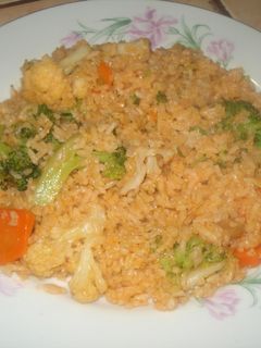 Una foto de Arroz entomatado con verduras