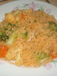 Una foto de Arroz entomatado con verduras
