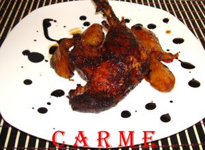 Una foto de Pato confitado con peras caramelizadas