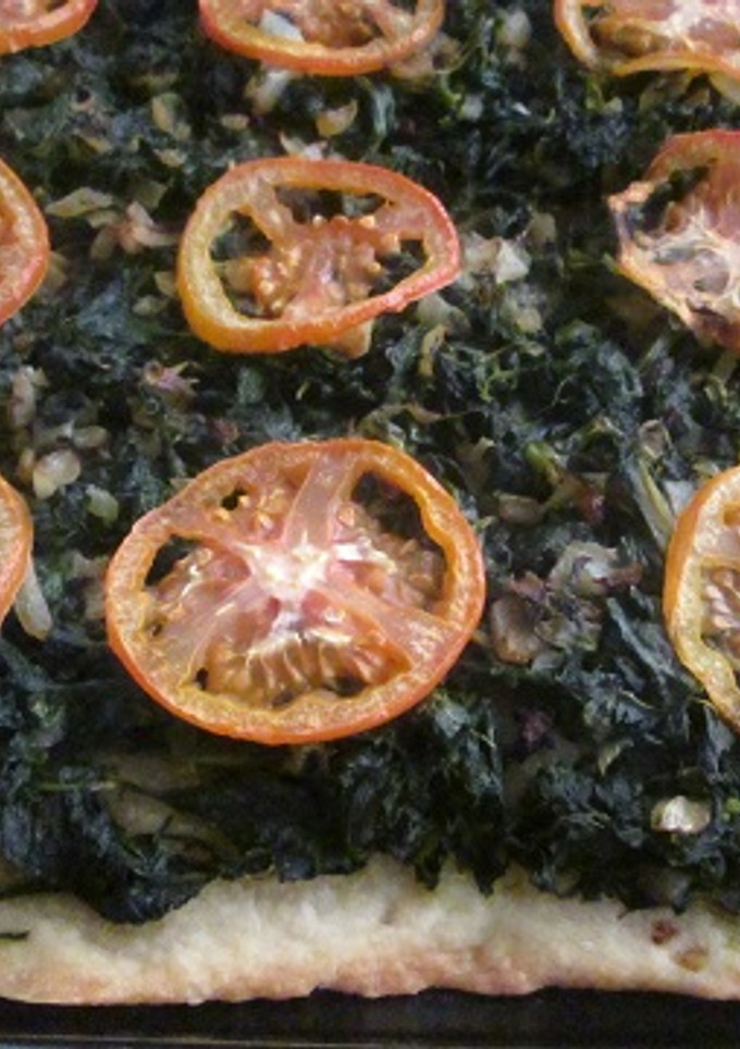 Una foto de Coca de espinacas