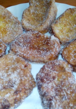 Una foto de Torrijas de naranjas rellenas de flan
