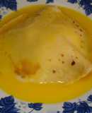 Crepes de naranja y helado de vainilla