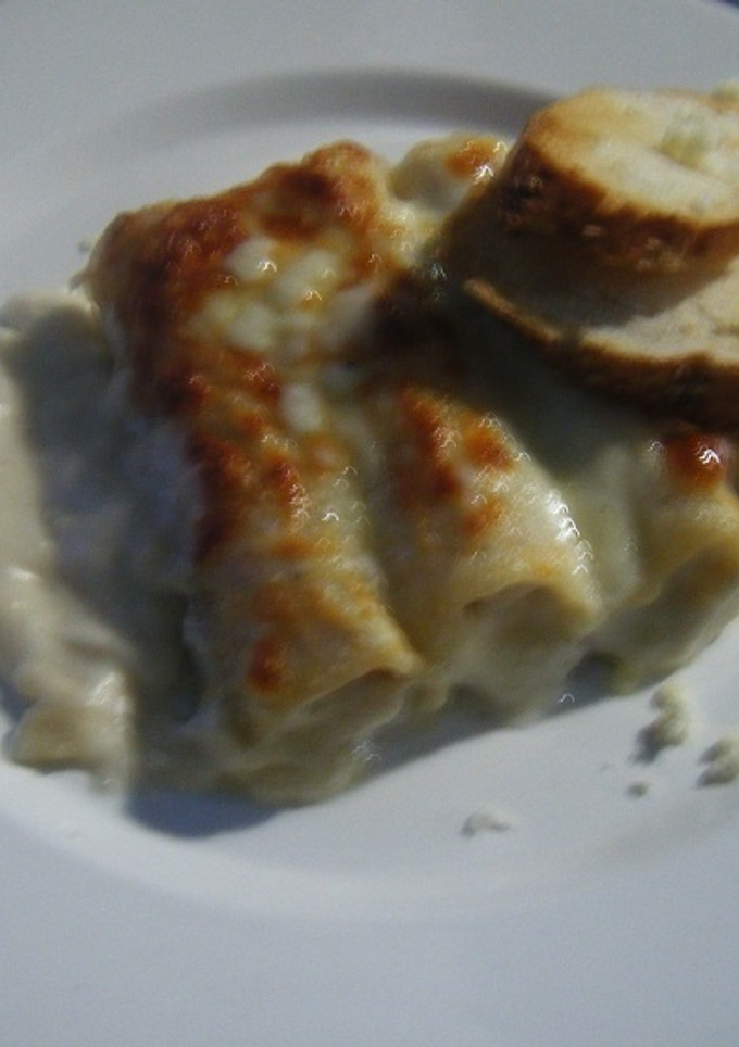 Una foto de Canelonni relleno con pescado 