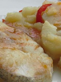 Una foto de Bacalao con pimientos