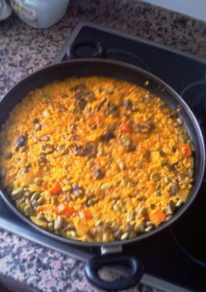 Una foto de Arroz con presa ibérica y habas