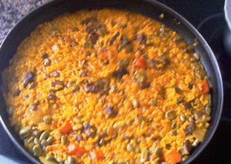 Arroz con presa ibérica y habas