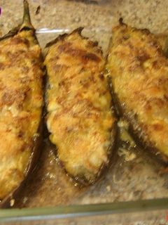Una foto de Berenjenas rellenas de jamón y gambas