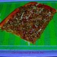 Pizza de carne y chimichurri