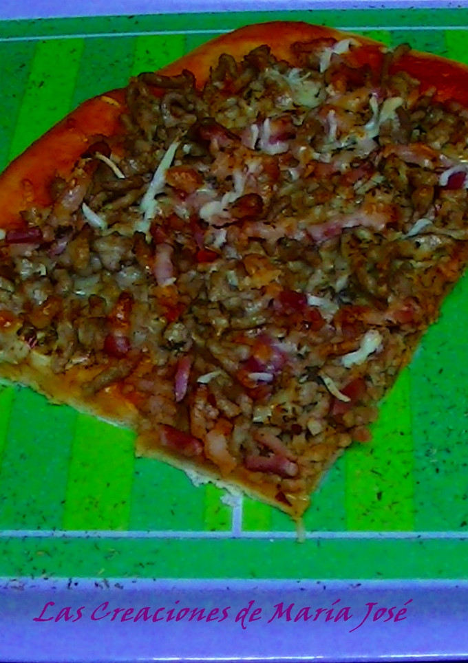 Una foto de Pizza de carne y chimichurri