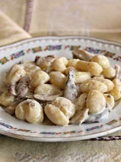 Una foto de Ñoquis con setas (Gnocchi ai funghi)