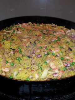 Una foto de Paella al disco de arado (para comer de parado!)