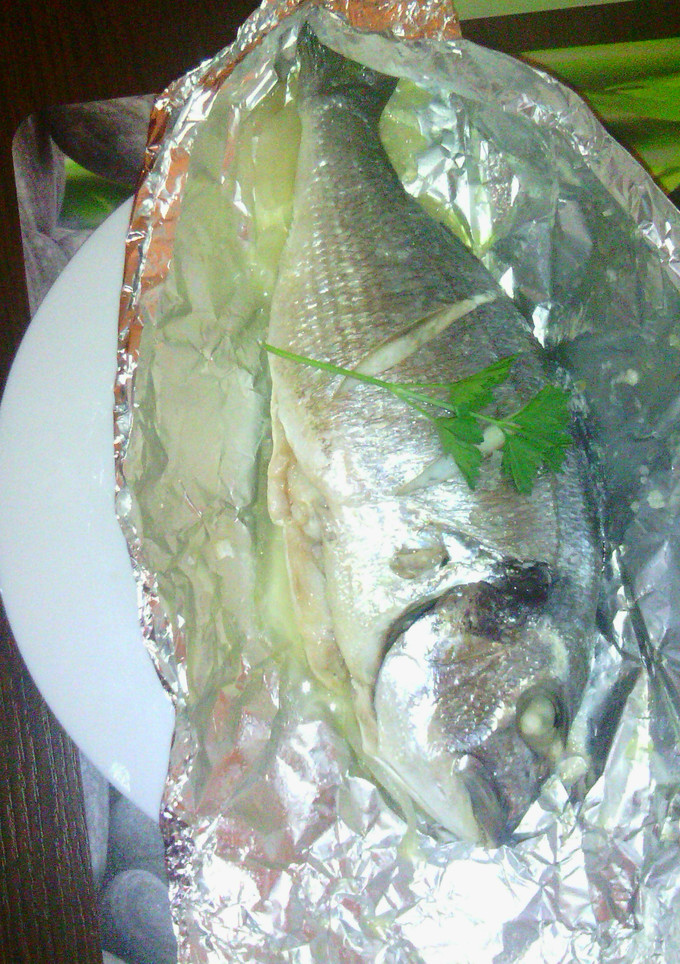 Una foto de Doradas en papillote con cebolla