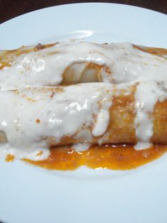 Una foto de Canelones de carne con salsa bechamel