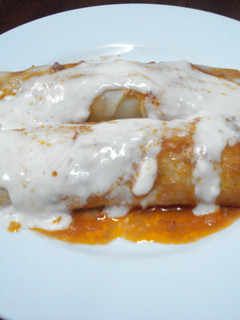 Una foto de Canelones de carne con salsa bechamel