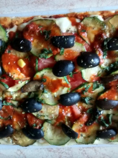 Una foto de Pizza vegetariana casera
