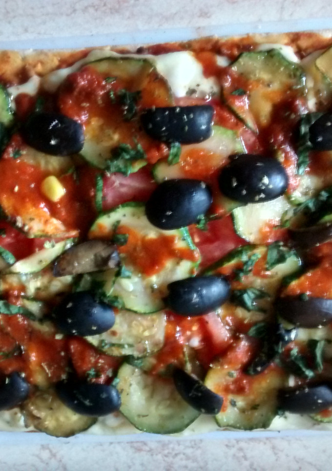 Una foto de Pizza vegetariana casera