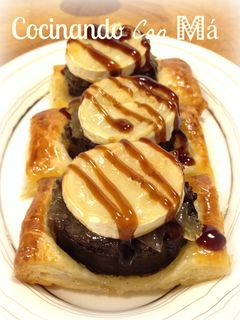 Una foto de Tapa de queso de cabra y morcilla de Burgos